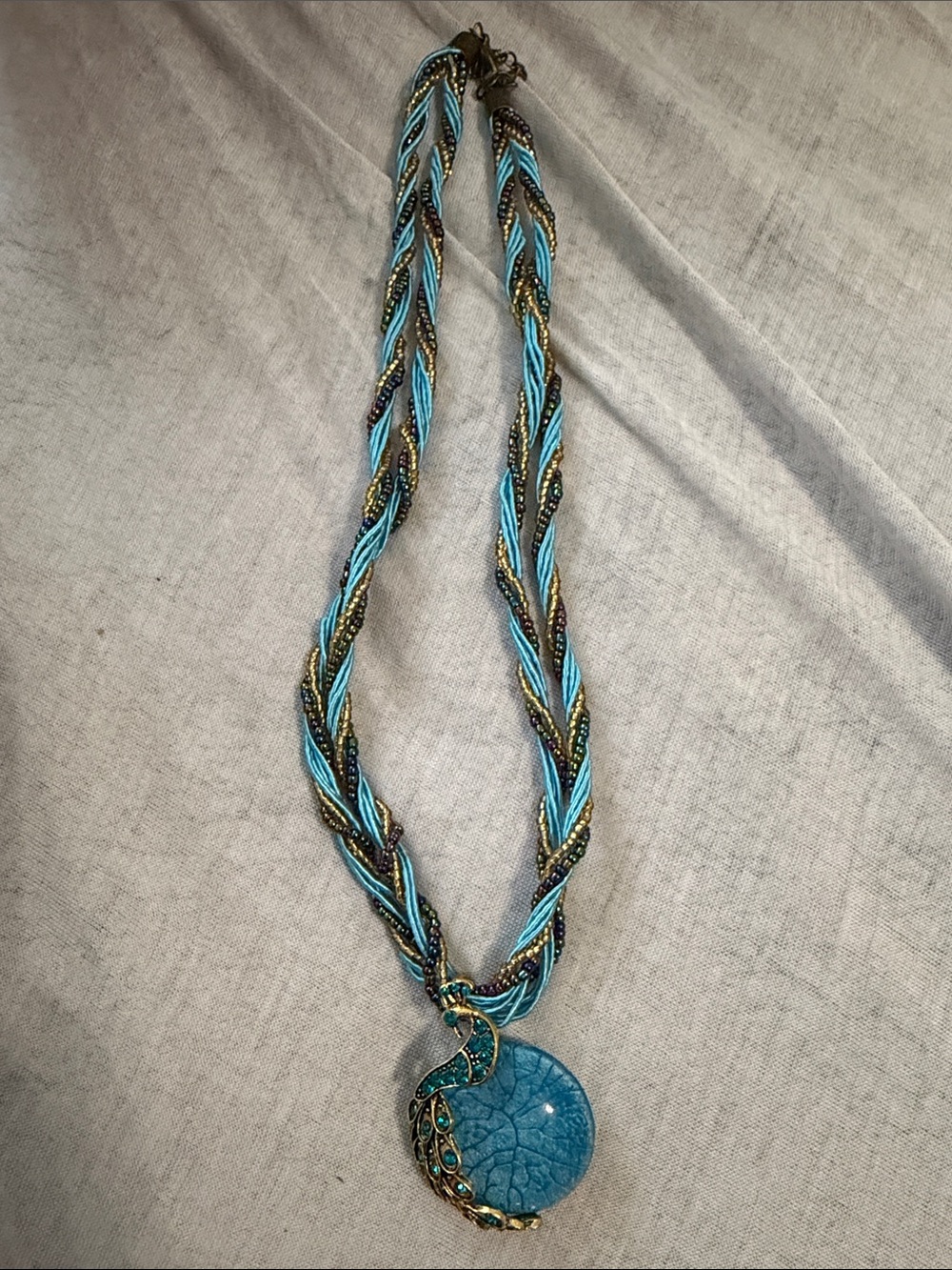 Handcrafted Blue Braided Necklace with Decorative Pendant